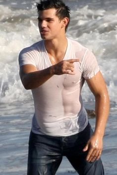 twilight actor taylor lautner in a wet white shirt