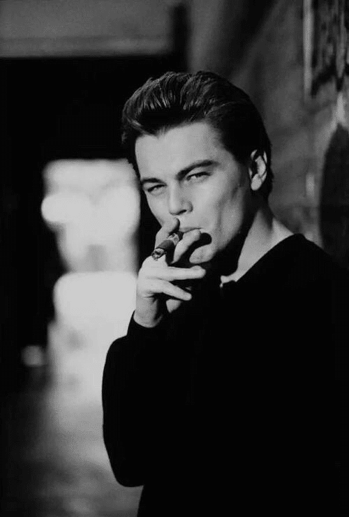 sexy pic of leonardo dicaprio smoking a cig in a black sweater