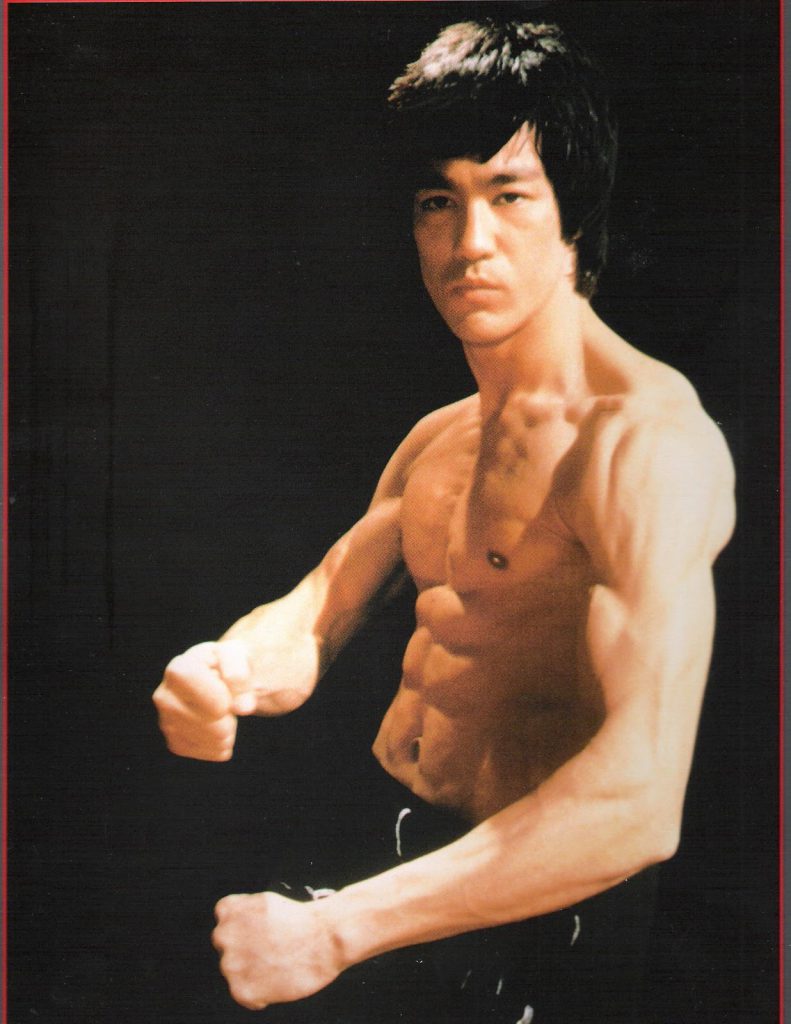 Bruce Lee flexing