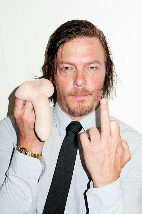 pic of norman reedus holding a penis and flipping the camera off