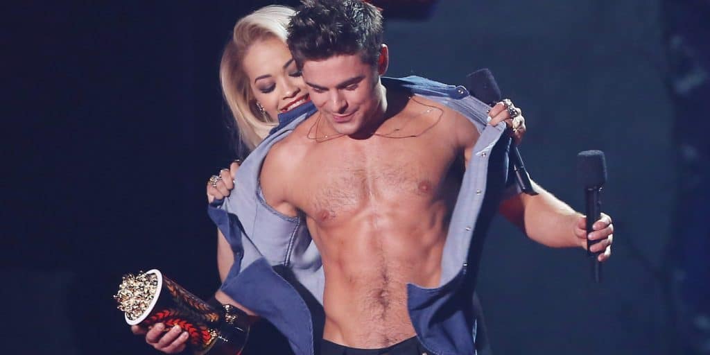 rita ora taking zac efron's shirt off