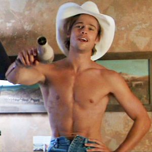 hottie brad pitt with no shirt on and cowboy hat on