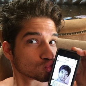 sexy instagram pic of Tyler Posey kissing his iphone with a pic of himself on it