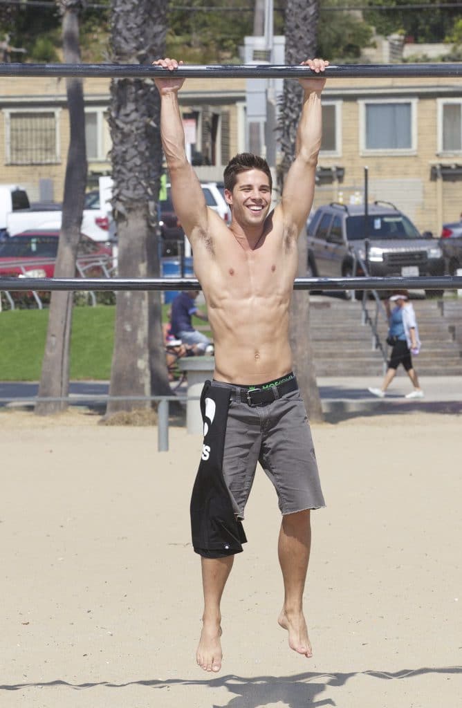 Dean Geyer ripped shirtless outdoors