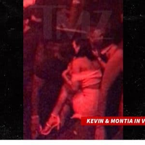 Close up of Kevin Hart and Montia at nightclub flirting