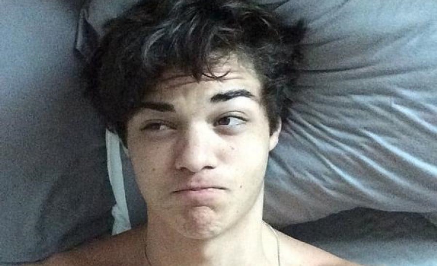 Noah Centineo selfie in bed